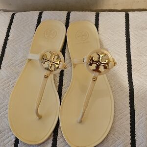 Tory Burch Cream T-Strap Sandals with Gold Medallion